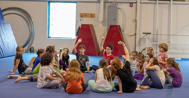 children in a group circle