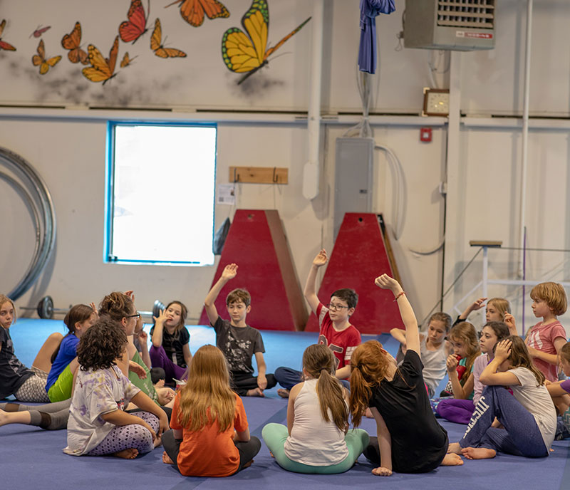 children in a group circle