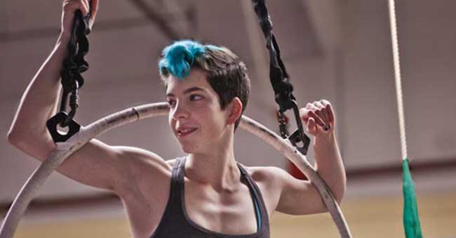 woman training on aerial hoop