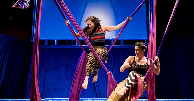 performers on aerial fabric
