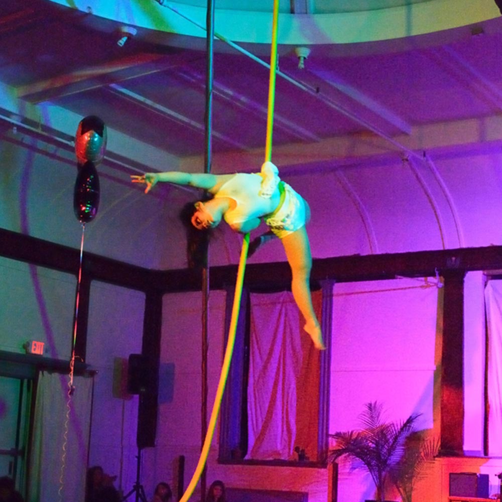 x dai performing on aerial rope